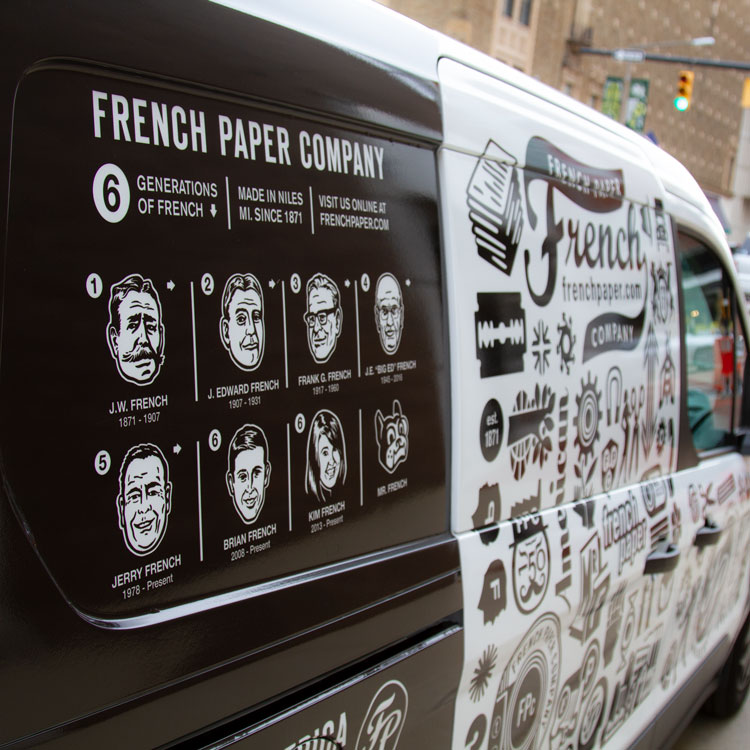 side of french paper van