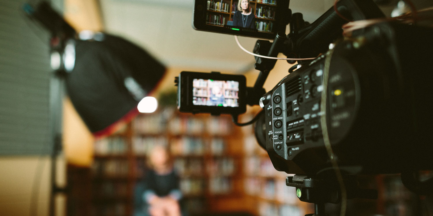 woman talking in front of camera