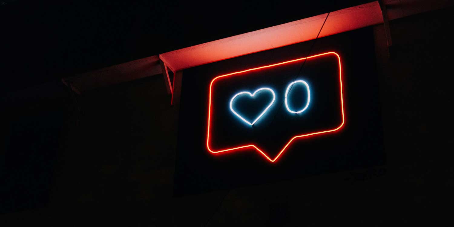 neon social media like sign