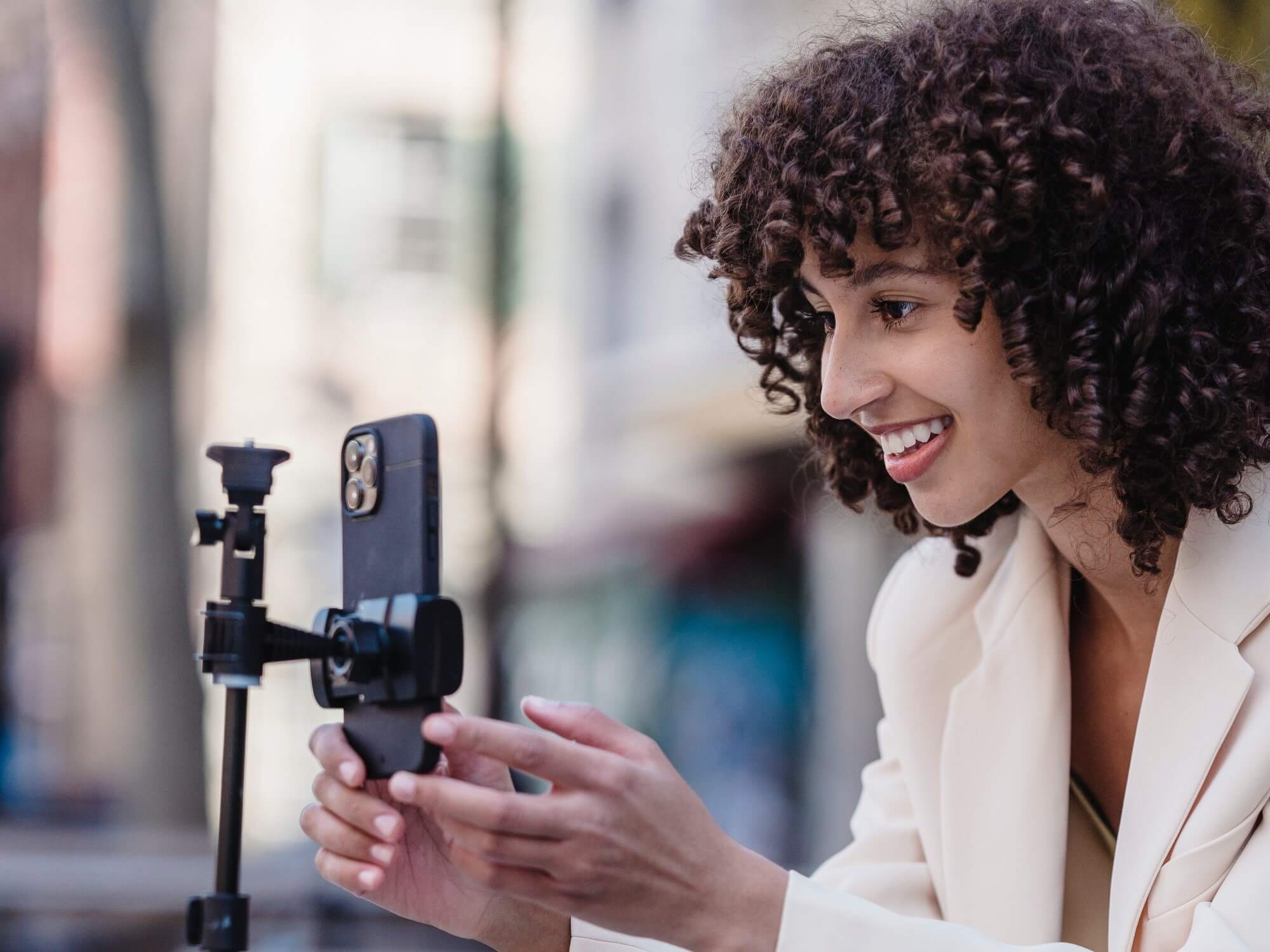 woman recording a video on a smart phone